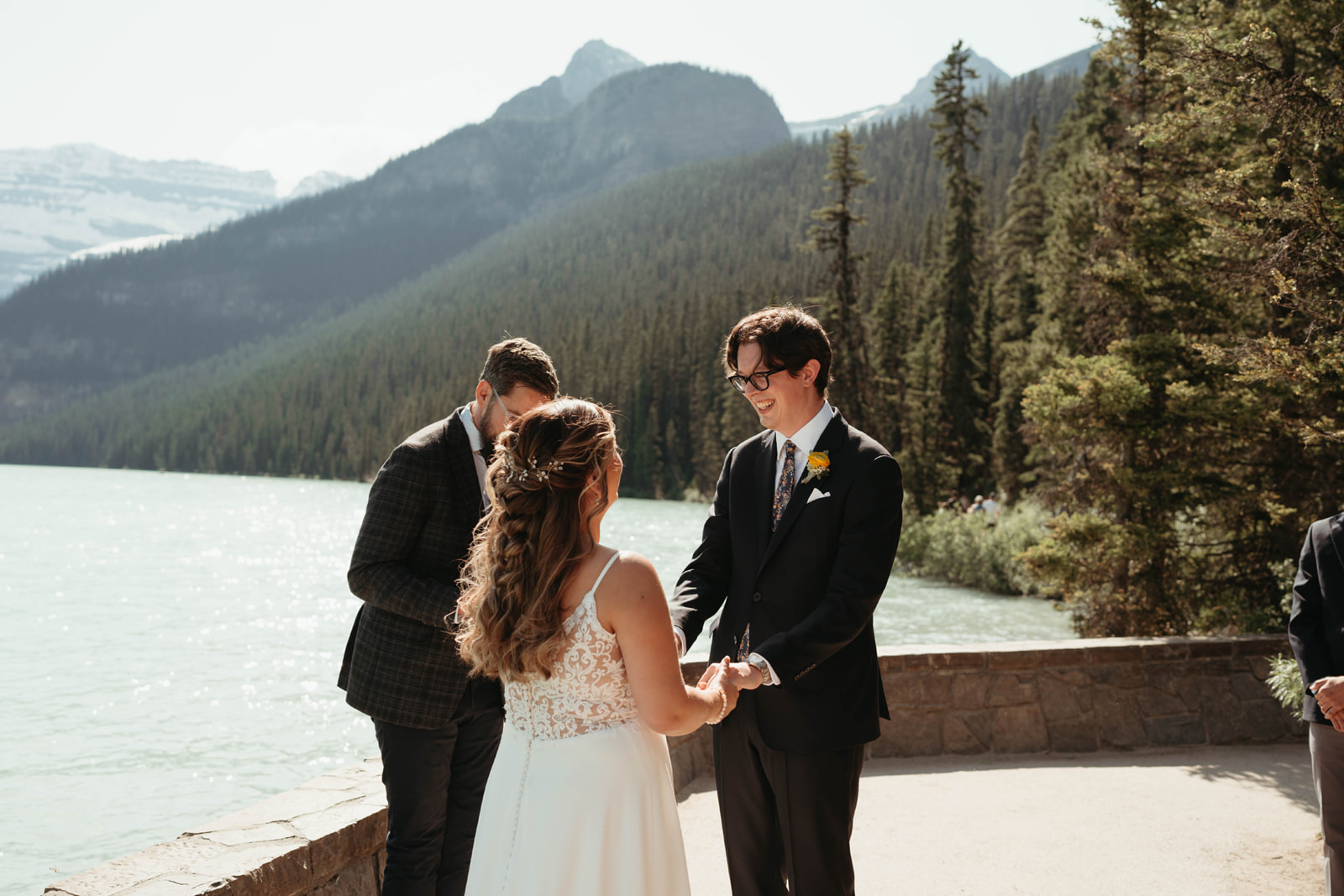 Our marriage at Lake Louise. The wedding is outside with the lake and mountains in the background